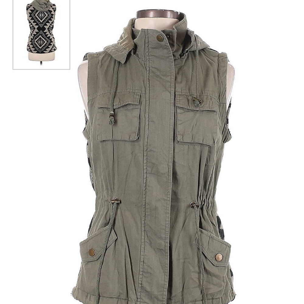 Cute utility vest, back stitched design. Size small.